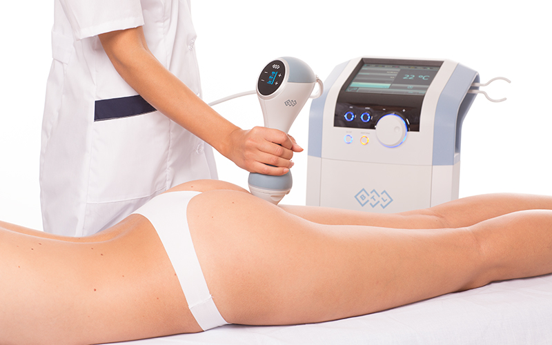 Female patient receiving EmTone® Outer Thigh Treatment